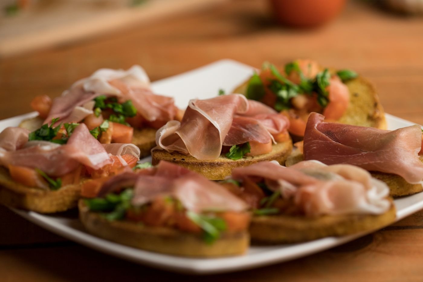 Tomato Bruschetta with Prosciutto and Parsley