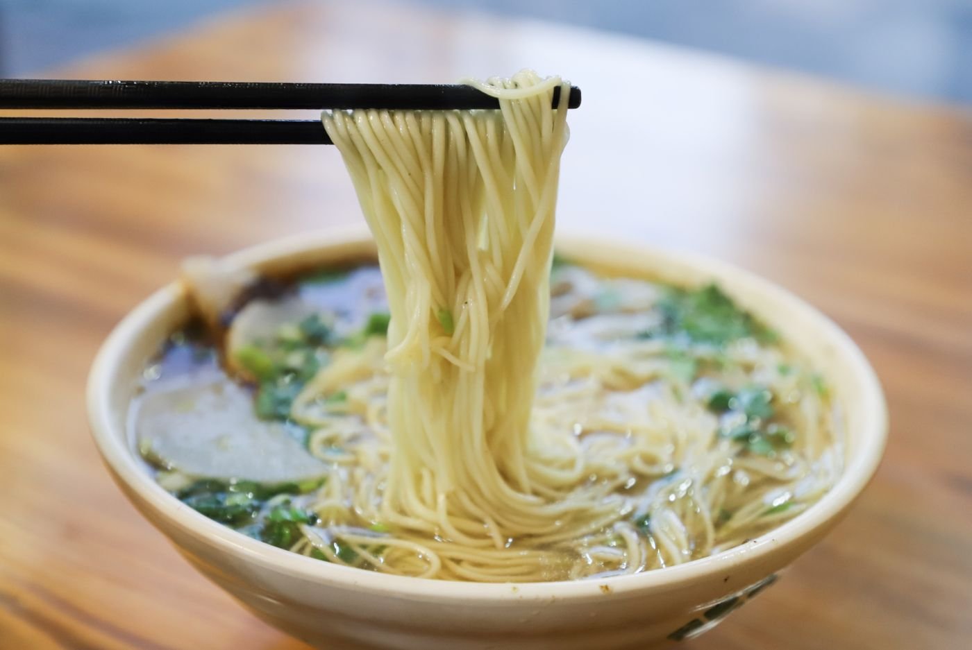 Clear Broth Wheat Noodle Soup with Tender Greens