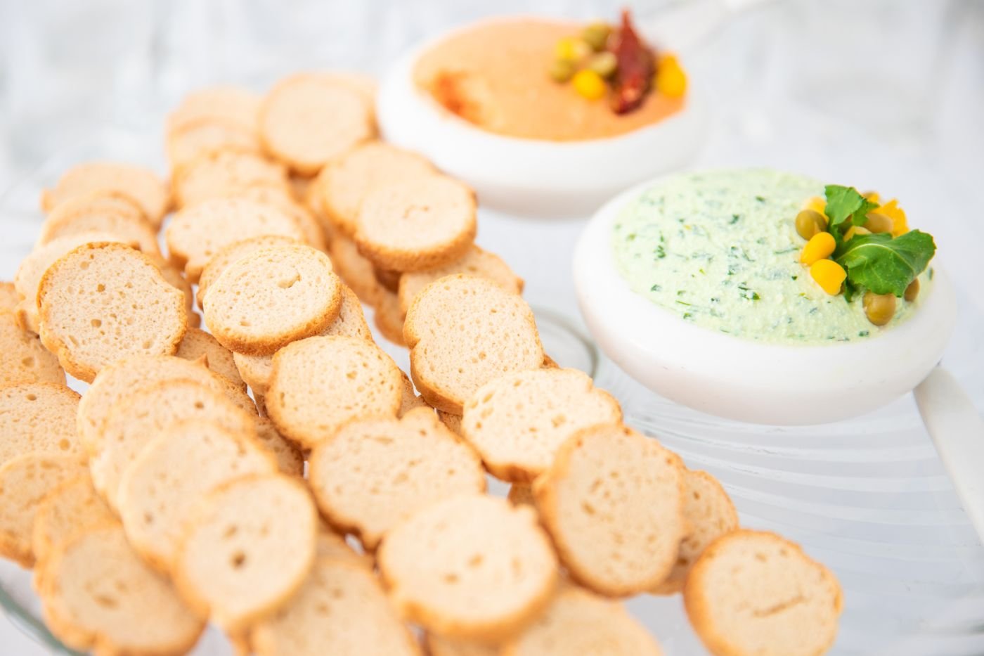 Baguette Crisps with Herbed Feta and Roasted Pepper Dips