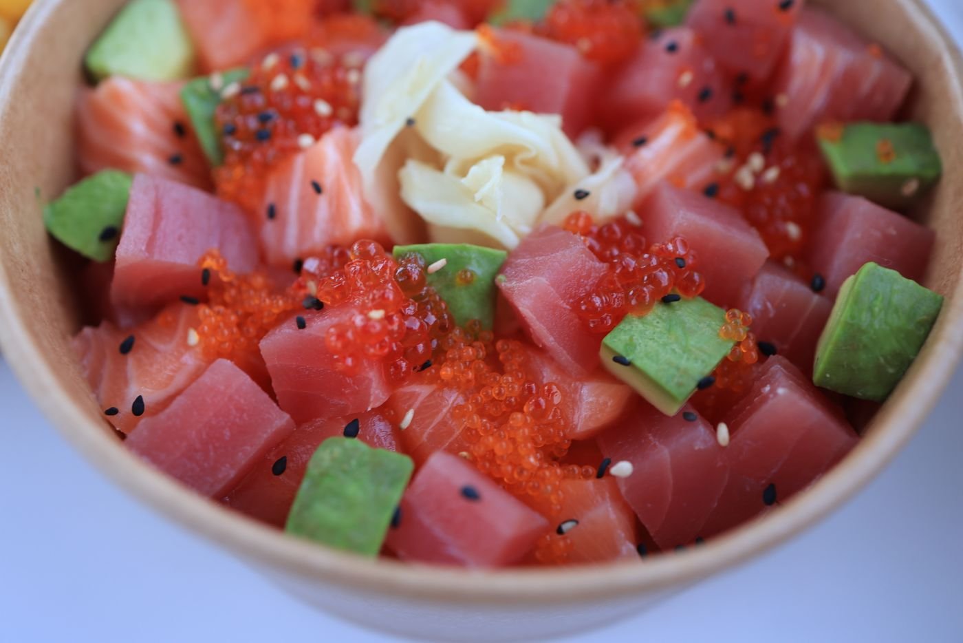 Tuna and Salmon Poke Bowl with Tobiko and Pickled Ginger