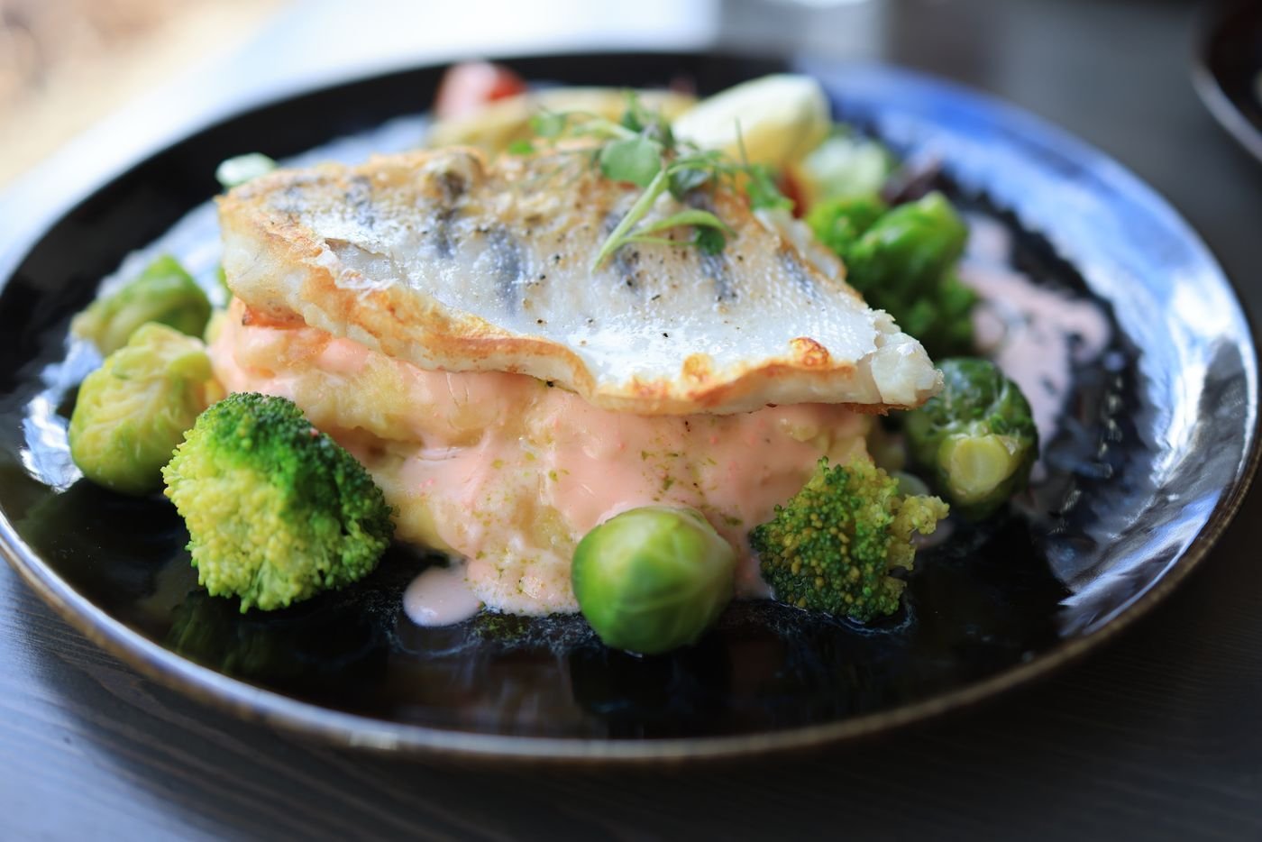 Seared Sea Bass with Tomato Cream and Brussels Sprouts