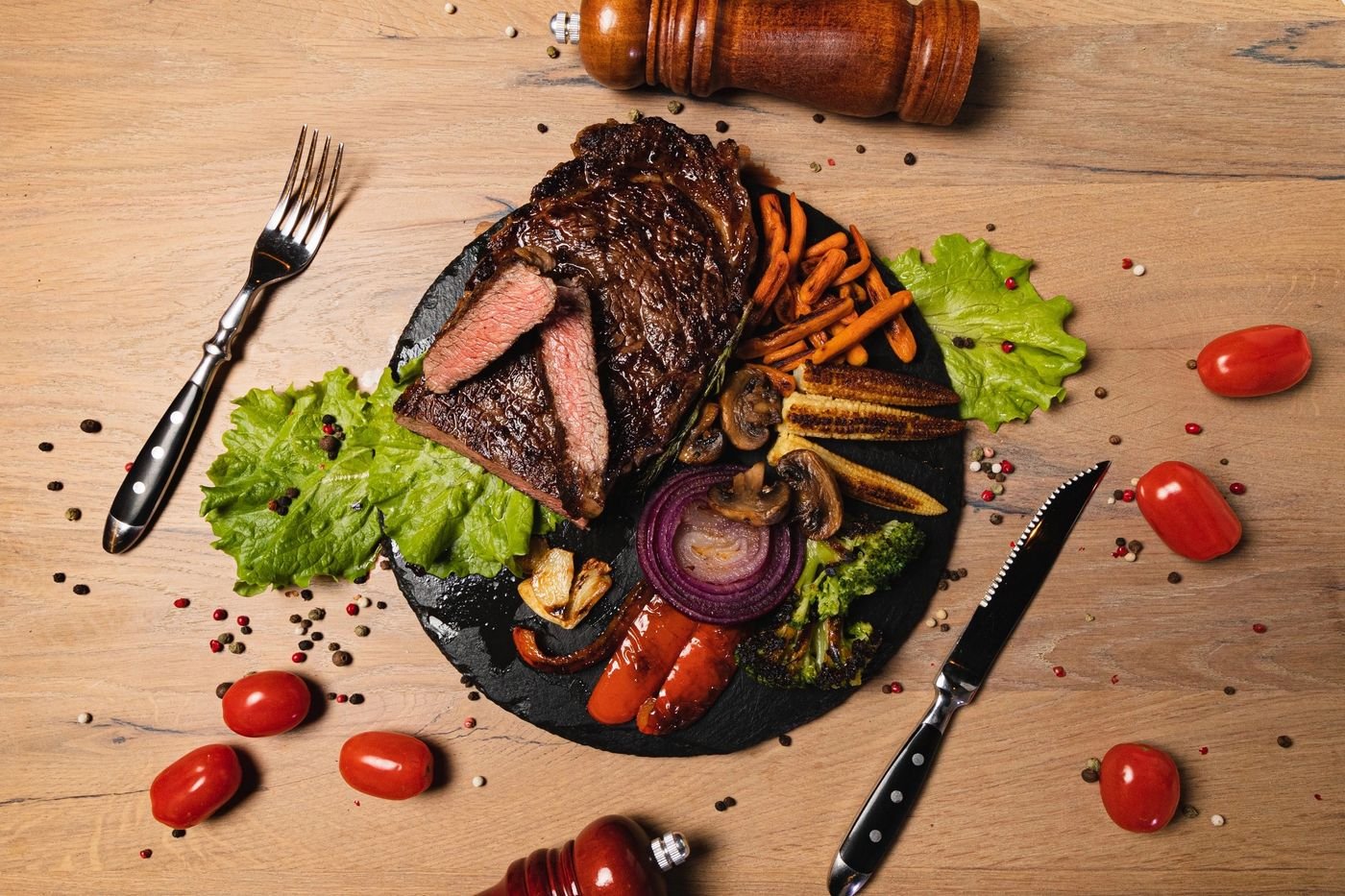 Grilled Ribeye with Charred Carrots, Mushrooms and Red Onion