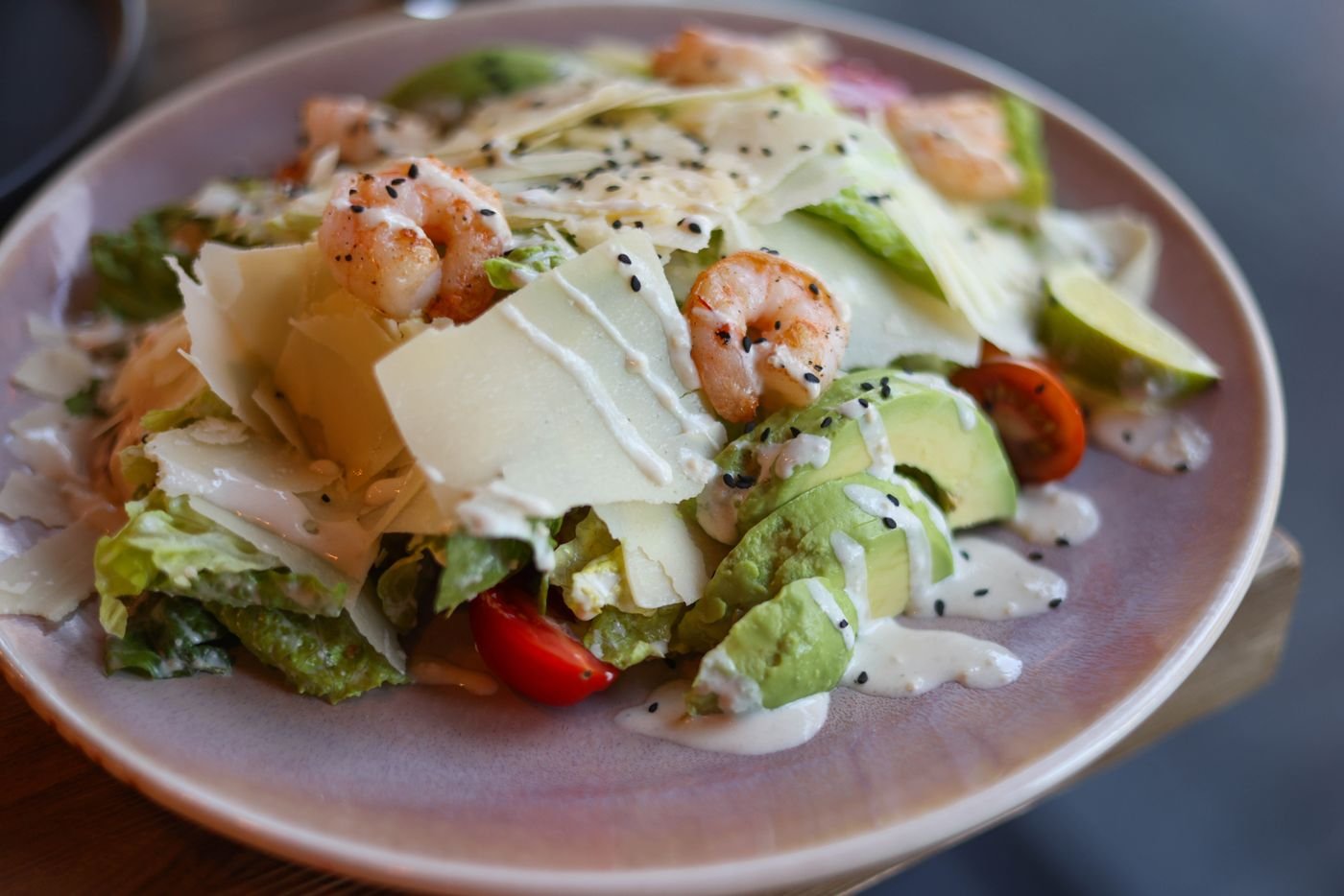 Shrimp Caesar Salad with Shaved Parmesan and Avocado