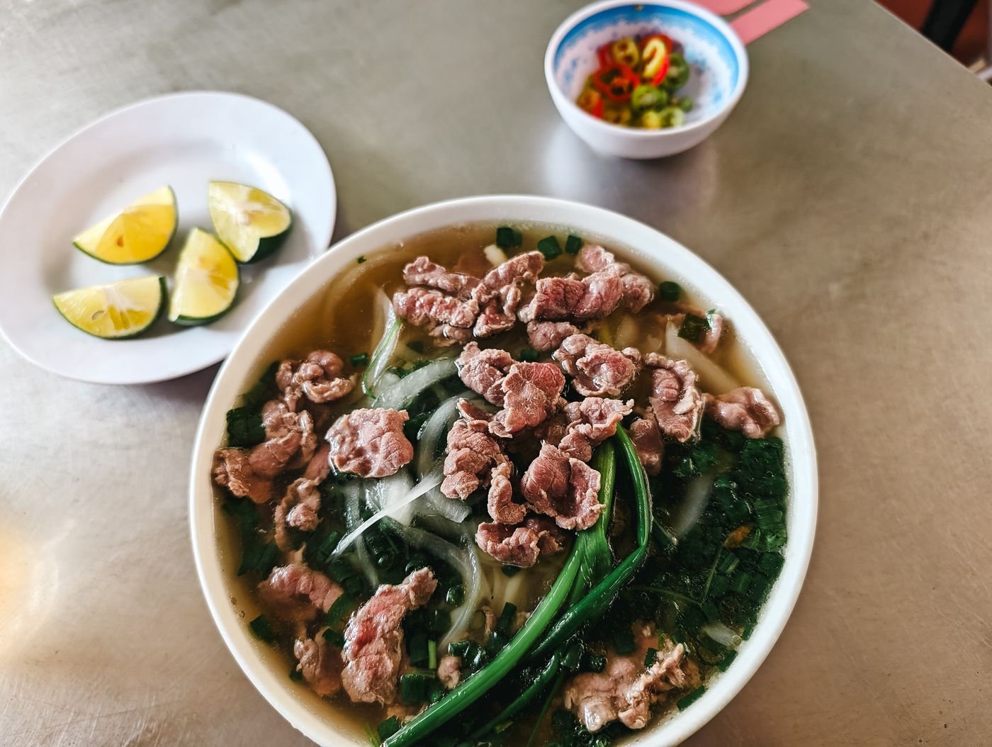 Hanoi-Style Pho Tai with Rare Beef and Scallion Stalks