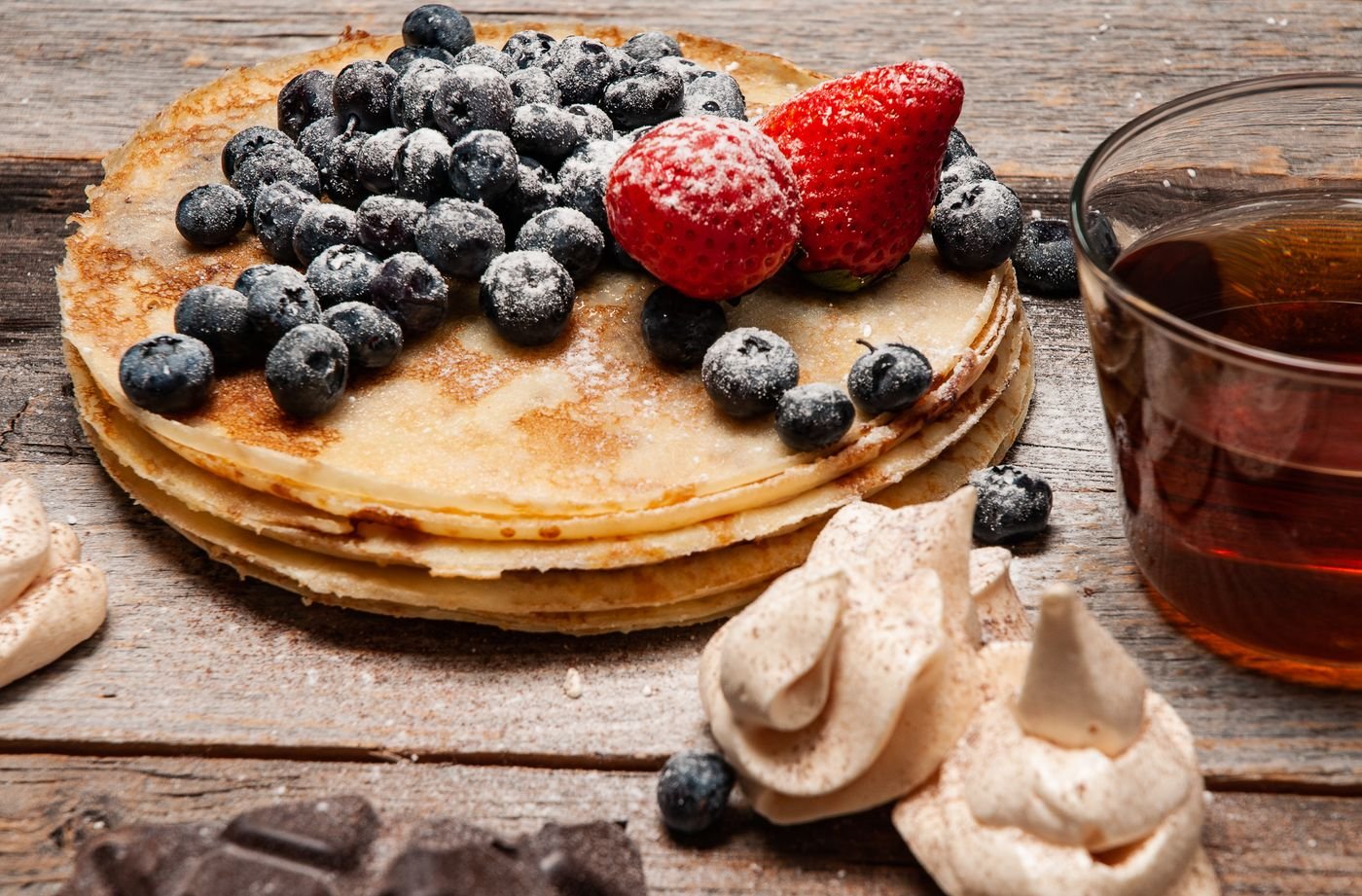 Thin Crepes with Blueberries and Sugared Strawberries