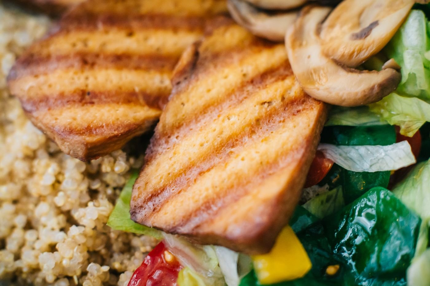 Grilled Tofu Steaks over Quinoa and Greens