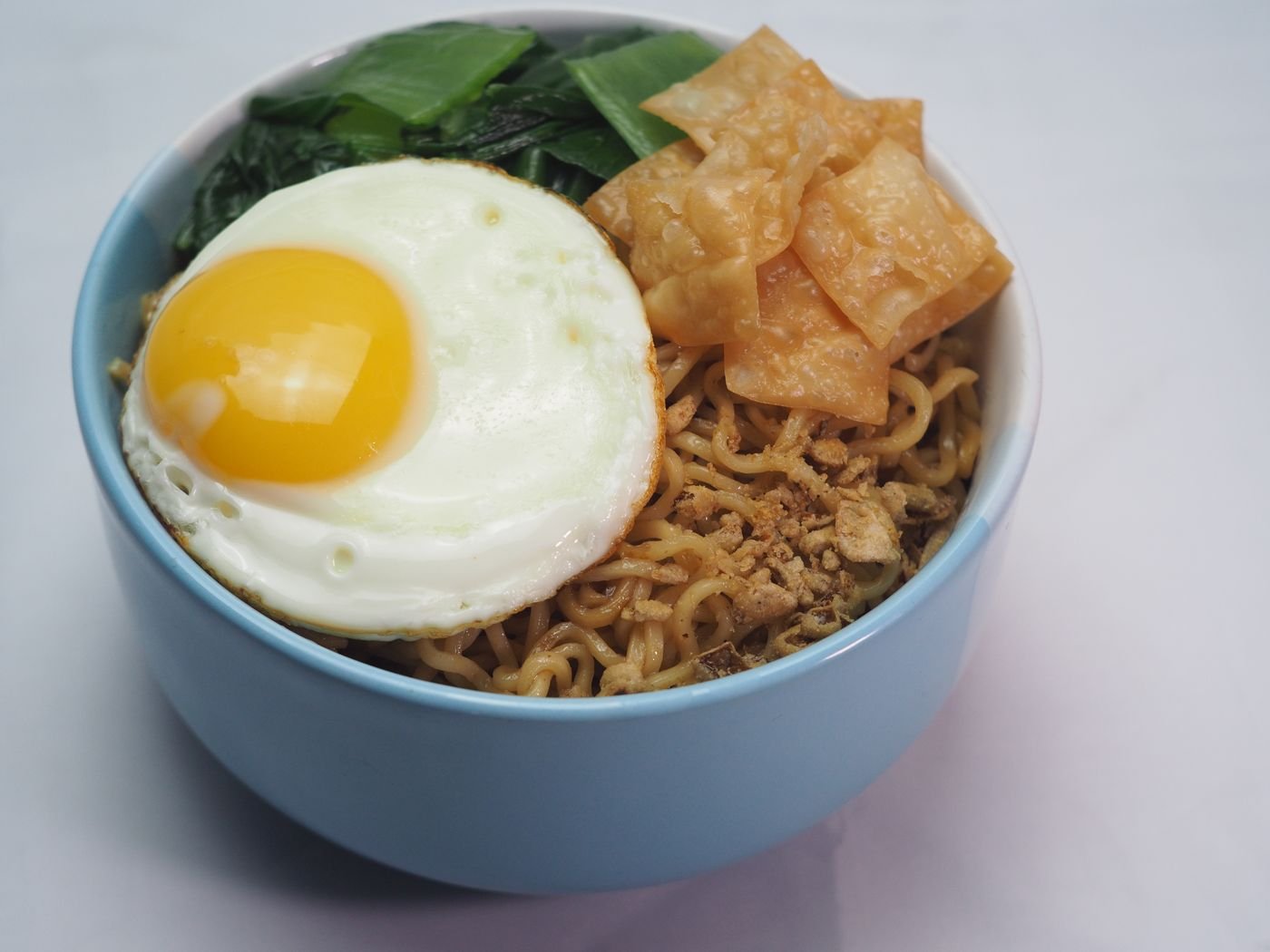 Mie Goreng with Fried Egg and Crispy Wonton Crackers