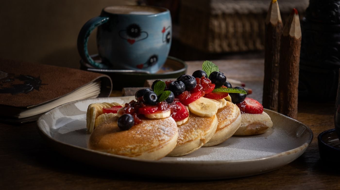 Fluffy Hotcakes with Banana, Strawberries and Blueberries