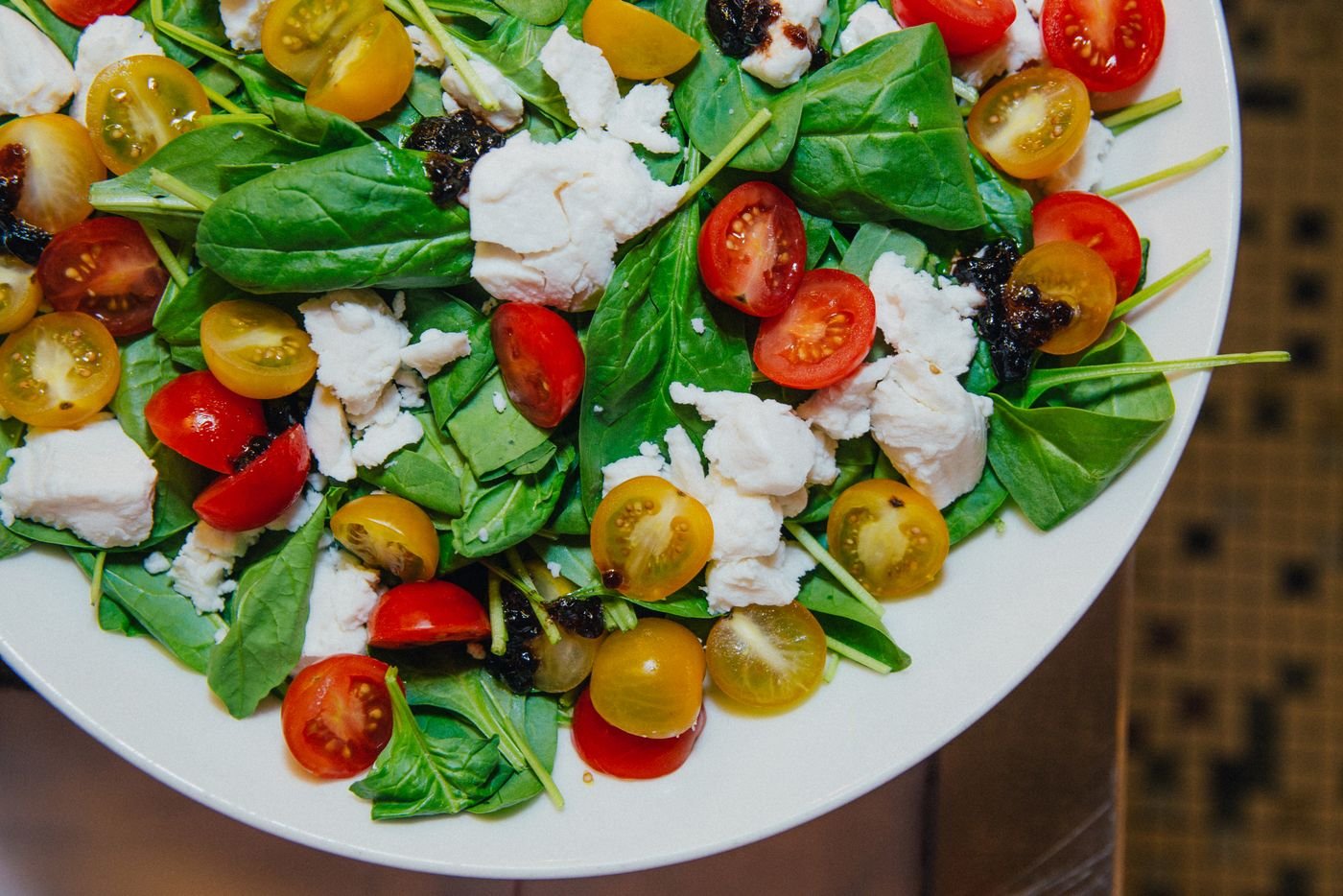 Spinach Salad with Goat Cheese, Heirloom Cherry Tomatoes and Olives
