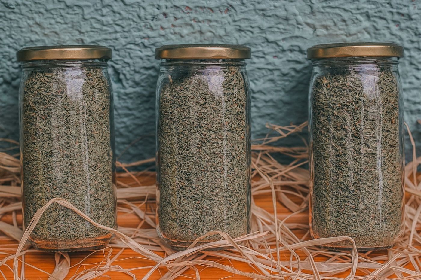 Tall Glass Herb Jars with Gold Lids, set of three