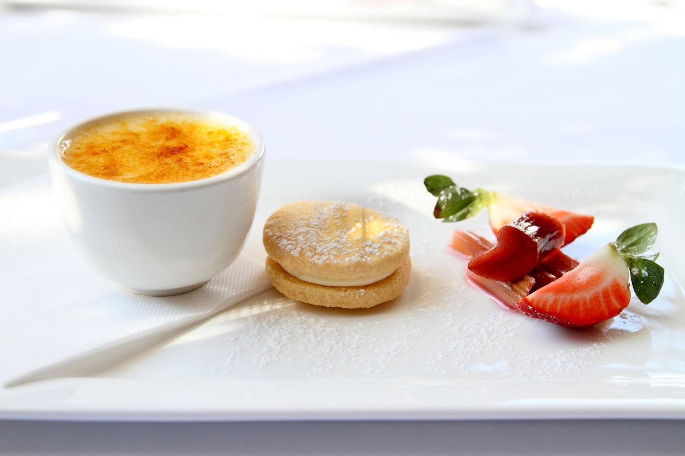 Vanilla Bean Creme Brulee with Strawberries