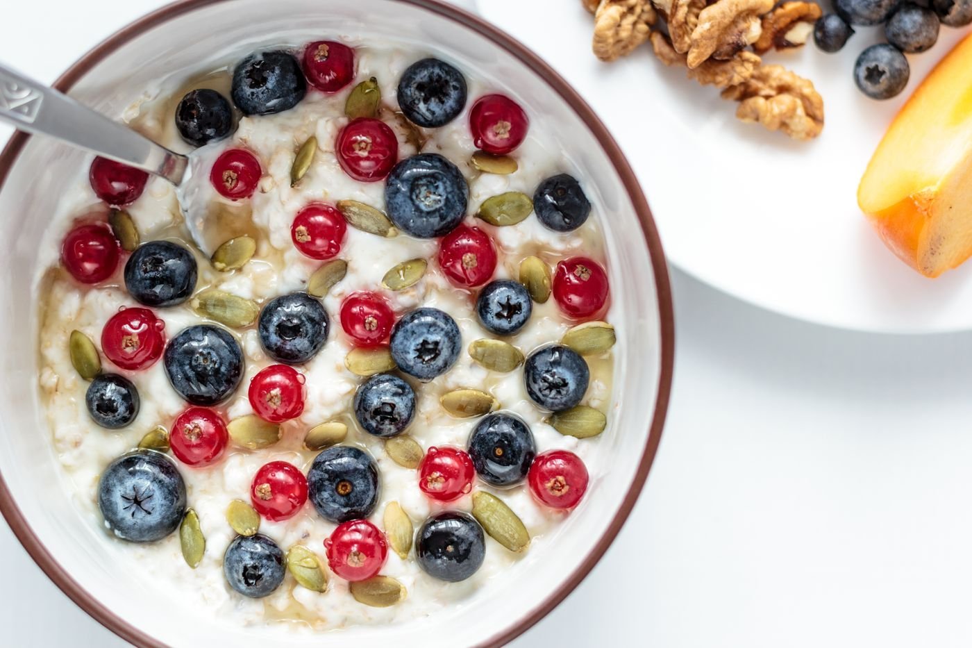 Overnight Oats with Blueberries, Red Currants and Pumpkin Seeds