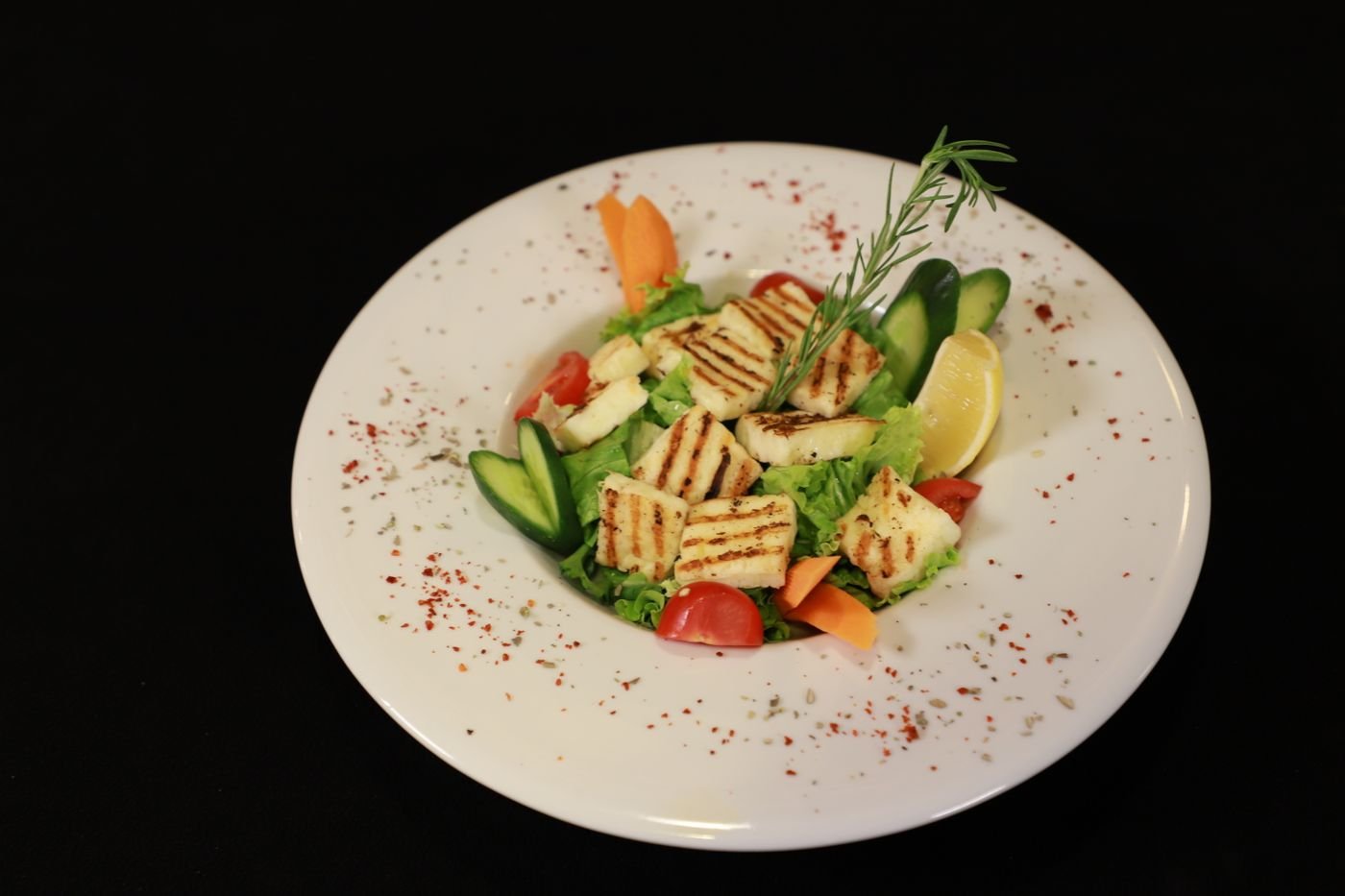 Grilled Halloumi with Crisp Greens, Cucumber and Lemon