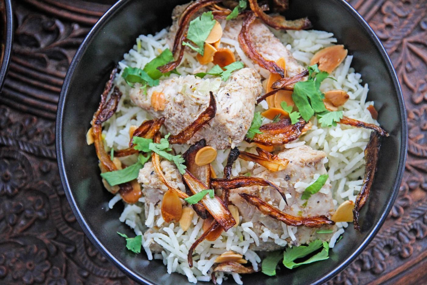 Chicken Yakhni Pulao with Almonds and Crispy Onions