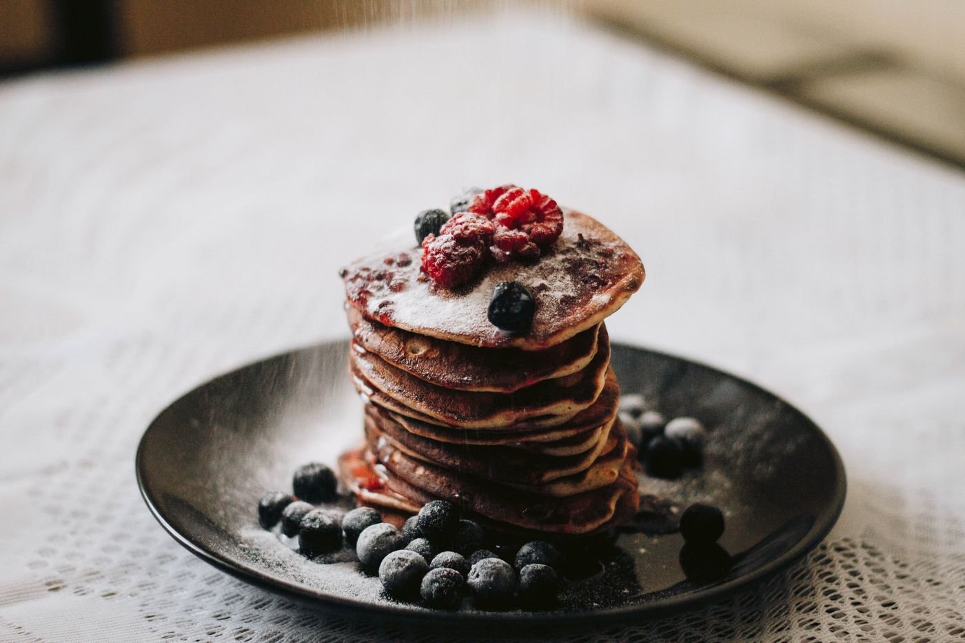 Cocoa Pancake Tower with Raspberries and Blueberries
